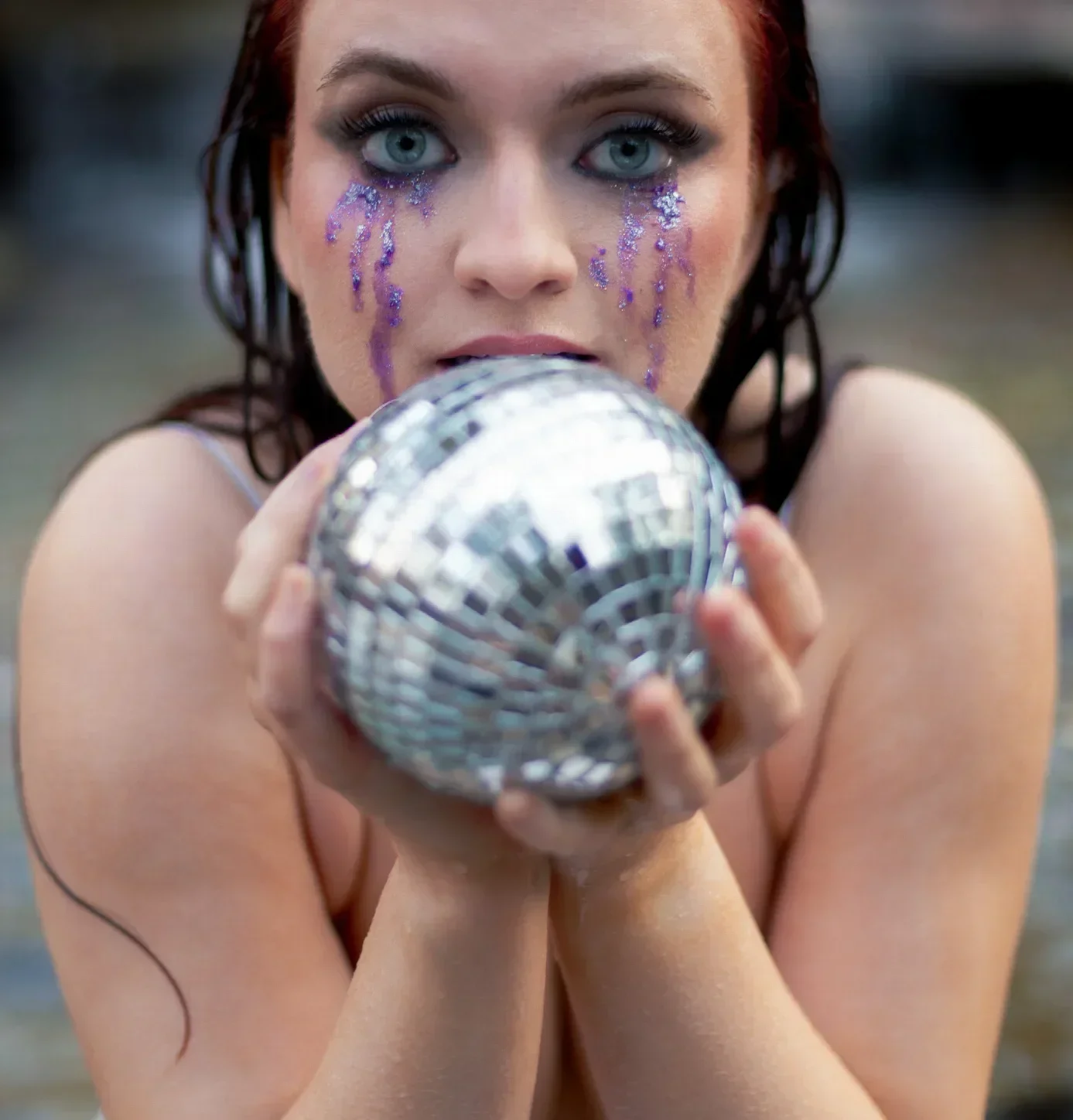 Scarlet O'Hara holding a mirror ball